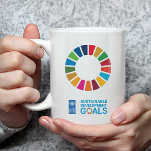 Authentic-sdgs-corporate-mug-United-nations-development-programme_hand_hold_close