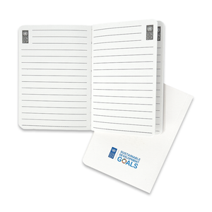 Inside pages of the SDGs Mini Notebook with ruled lines and UNDP logo in the corners