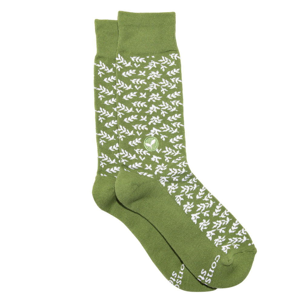 Green socks with white leaves print
