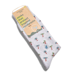 Socks that Plant Tropical Rainforests in grey with palm tree design in packaging against white background